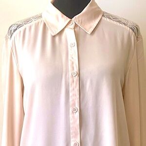Button Up Blouse with a Lace back.